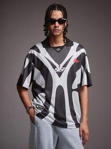 เสื้อเจอร์ซีย์อเมริกันฟุตบอลผู้หญิงขายส่ง สีขาวลายพราง หมายเลขพิมพ์บนผ้าตาข่าย ทรงโอเวอร์ไซส์ สตรีทแวร์ รับผลิตตามสั่ง OEM ขายส่งจำนวนมาก - Product Image 5