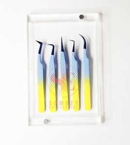 แหนบคีบขนตาสีฟ้าพลาสม่าสองสีทำจากสเตนเลสปลายแหลม90องศาโลโก้ตามสั่ง - Product Image 1