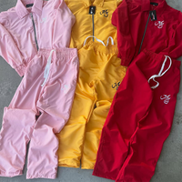 Ensemble de survêtement unisexe léger avec logo brodé, coupe oversize, en nylon, coupe-vent imperméable avec fermeture éclair, fabriqué en usine OEM.