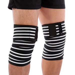 Genouillère de compression unisexe noire et blanche rayée en tricot respirant avec fermeture auto-agrippante pour la protection du genou - Product Image 1