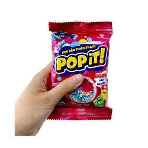 Venta al por mayor de caramelos de goma frutales marrones de alta demanda, dulces de gelatina con azúcar en forma de cubo Asteroid Popit, envasados en bolsas de 25g - Product Image 5