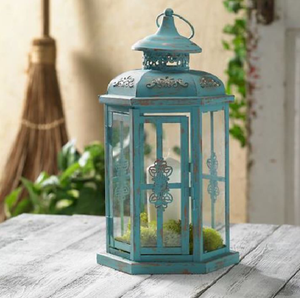 Radiant golden Moroccan style metal <b>lantern</b> with glowing geometric cutout panels., available at wholesale prices. - Product Image 3