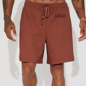กางเกงขาสั้นผู้ชายเนื้อผ้านุ่มสบายสำหรับฤดูร้อน/สีพื้น ออกแบบโลโก้ได้ตามต้องการ ปี 2026 ราคาถูกสำหรับการสั่งซื้อแบบขายส่ง ทรงหลวมใส่สบาย - Product Image 1