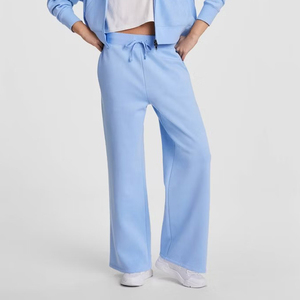 Pantalon de survêtement large bleu clair pour femme, taille mi-haute, avec cordon de serrage, poches latérales, détail de bouton sur le bas, ourlet ouvert - Product Image 2
