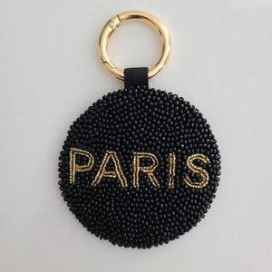 พวงกุญแจทรงกลมประดับลูกปัด NOUSHAD HANDICRAFTS รุ่น NH-810 Paris สีดำ-ทอง ตัวอักษรแบบคลาสสิก ผ้าแคนวาสน้ำหนักเบา พร้อมช่องใส่เหรียญ - Product Image 1