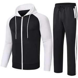 Ensemble de survêtement à capuche noir et blanc avec blocs de couleur, manches longues, fermeture éclair, poches latérales, style sportif décontracté, collection automne - Product Image 1