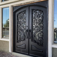 Portes d'entrée en fer forgé et verre, étanches, de luxe, sur mesure, pour extérieur, avec ouverture battante, finition artisanale, modèle 2026