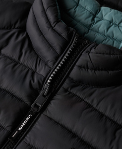 Chaqueta de invierno acolchada personalizada para mujer, ropa informal premium para exteriores, a prueba de viento, con cierre de cremallera y bolsillos laterales. - Product Image 5