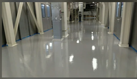 Revêtement de sol époxy industriel pour entrepôts, usines, ateliers et centres logistiques avec un revêtement de sol protecteur durable et sans joint
