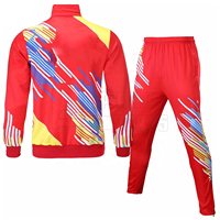 Ensemble de survêtement de football personnalisé OEM, dernier design, impression par sublimation, veste et pantalon de sport en polyester à séchage rapide pour l'entraînement