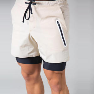 กางเกงออกกำลังกายผู้ชายแบบมีซับในรัดรูป รุ่น Custom Men 2 1 สำหรับวิ่งและออกกำลังกาย มีช่องใส่โทรศัพท์ ผลิตจากผ้าแคนวาส เอวสูง สีพื้น ทอแบบเรียบ แห้งเร็ว รับผลิตแบบ OEM - Product Image 4