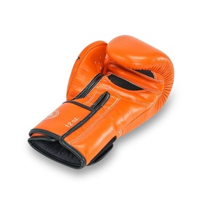 ถุงมือชกมวย Fairtex สีส้มแบบกำหนดเองได้ พร้อมสายรัดข้อมือแบบ Hook Loop ทำจากหนังวัวแท้ สำหรับกีฬาซานด้าและศิลปะการต่อสู้กลางแจ้ง - Product Image 6
