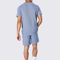 Ensemble de survêtement décontracté pour homme en coton tricoté 100 % uni, respirant et sans coutures, avec logo personnalisé, deux pièces, t-shirt et short