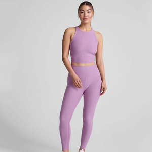 ชุดออกกำลังกายสำหรับผู้หญิงแบบ 2 ชิ้น เสื้อครอปท็อปยืดหยุ่นคลุมหลังเต็มตัวและกางเกงเลกกิ้งสีม่วง สำหรับออกกำลังกายและโยคะ - Product Image 6