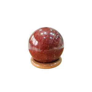 Sphère en pierre rouge polie sur base en bois, décoration artisanale pour la maison - Product Image 1