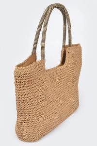 Découvrez la touche d'élégance estivale ultime avec ce magnifique sac en fil naturel, conçu avec une poignée robuste et un intérieur spacieux. - Product Image 5