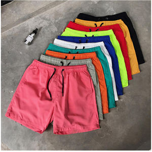 กางเกงขาสั้นชายหาดผ้าแคนวาสสีพื้นสำหรับผู้ชายขายส่ง ซับในนุ่ม เอวยางยืด กันน้ำ แห้งเร็ว - Product Image 1