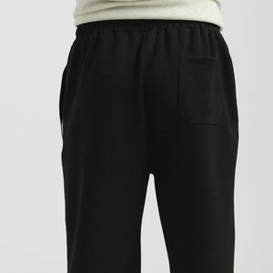 กางเกงสเวตเตอร์ผ้าฝ้ายหลายสีสำหรับผู้ชายกางเกงลำลองขายาวมีกระเป๋าเอวกลางปรับแต่งโลโก้ได้ตามต้องการ - Product Image 3