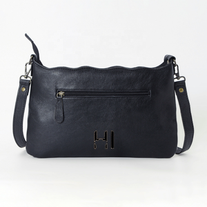 Bolso Bandolera de Cuero Vacuno Estilo Bohemio Occidental con Pelo Natural y Correa Ajustable - Product Image 6