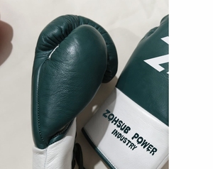 ถุงมือชกมวยหนังแท้พรีเมียม รับทำโลโก้ตามสั่ง โรงงานผลิตอุปกรณ์ชกมวย MMA มวยไทย คิกบ็อกซิ่ง สำหรับซ้อมและต่อยมวยหนัก - Product Image 4