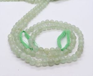 ลูกปัดหยกอังกุรีธรรมชาติทรงกลมเรียบ ขนาด 6.5-7 มม. ลูกปัดหยกสีเขียวทรงกลม 13 นิ้ว หยกอังกุรีแบบเรียบสำหรับทำเครื่องประดับ - Product Image 3