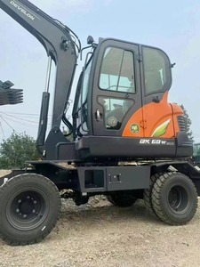 Mini-excavatrice sur roues Develon DX60W ECO 5,5 tonnes, godet de 0,18 m, système hydraulique, moteur, boîte de vitesses, pompe pour une efficacité élevée - Product Image 1