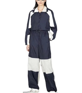 Conjunto Deportivo Premium para Mujer, Chaqueta Cortavientos Ligera Impermeable con Cierre y Pantalones Deportivos Casuales de Dos Piezas con Capucha - Product Image 1