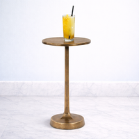 Table de bar en aluminium moulé de qualité supérieure, piétement fin, plateau rond, finition or brossé, base robuste, construction durable, accent moderne et luxueux