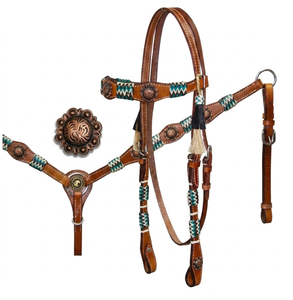 Conjunto de cabezada y pechopetral de cobre pintado con motivos florales y grabados, con costuras de puntada americana en verde azulado y riendas de cuero dividido, de temporada. - Product Image 2