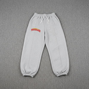 Pantalon de survêtement gris en coton pour homme, taille élastique avec cordon de serrage, imprimé lettres sur la jambe droite, poids moyen, idéal pour l'automne - Product Image 1