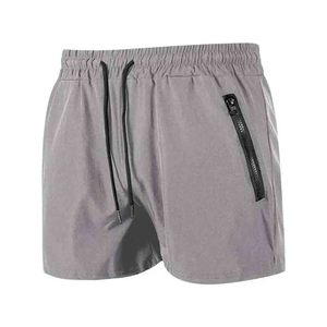 Shorts de sport pour homme, bleu uni, séchage rapide, taille élastique, cordon de serrage, poche zippée, décontractés, pour la course à pied - Product Image 4