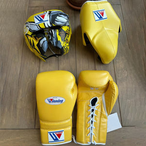 ชุดมวยหนังแท้ขายดีรุ่นใหม่ พร้อมนวมชกมวย หมวกป้องกันศีรษะ และสนับแข้ง สำหรับฝึกซ้อมมวยไทย - Product Image 1