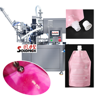 Machine de remplissage et de bouchage automatique de sachets à bec pour liquides visqueux, détergent à lessive rotatif SOLIDPACK