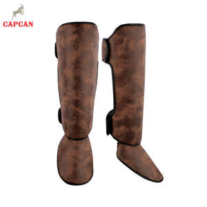 Espinilleras ajustables de precio de fábrica, ligeras, para Muay Thai, con protección para pies y rodillas - Product Image 1