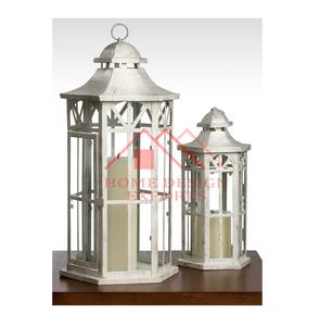 Farol de metal blanco estilo marroquí para velas de té, ideal para centros de mesa y decoración exterior. - Product Image 1