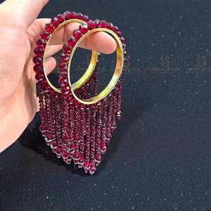 Brazaletes nupciales personalizados de hilo de seda con los nombres de los novios en letras doradas y un intrincado trabajo de piedras. - Product Image 1