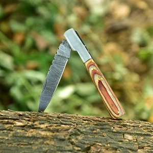 Couteaux pliants d'extérieur avec lame en acier finition stonewashed et manche robuste, conçus pour la pêche et les activités en plein air. - Product Image 4