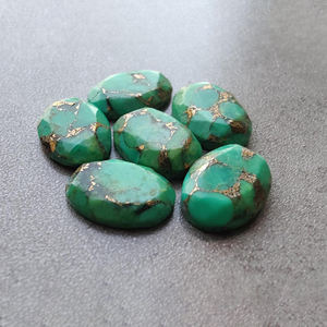 พลอยเทอร์ควอยซ์สีเขียวธรรมชาติเกรด AAA+ ทรงรีเหลี่ยมเพชรพลอย เจียระไนแบบเหลี่ยม  ฐานแบน  สำหรับทำเครื่องประดับ - Product Image 1