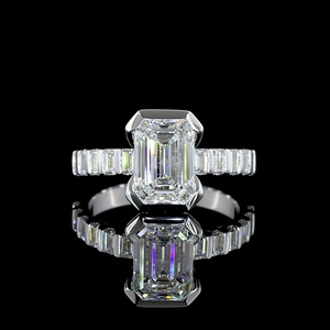 Bague de luxe pour femme en or blanc 14 carats avec diamant de laboratoire taille émeraude de 2 carats certifié IGI UNICORN JEWELS, sertie demi-cerclée - Product Image 1