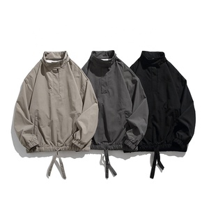 Chaquetas cortavientos ligeras de nailon con cremallera de 1/4 cuartos y cuello levantado para hombre con logotipo personalizado al por mayor de alta calidad para hombre - Product Image 1