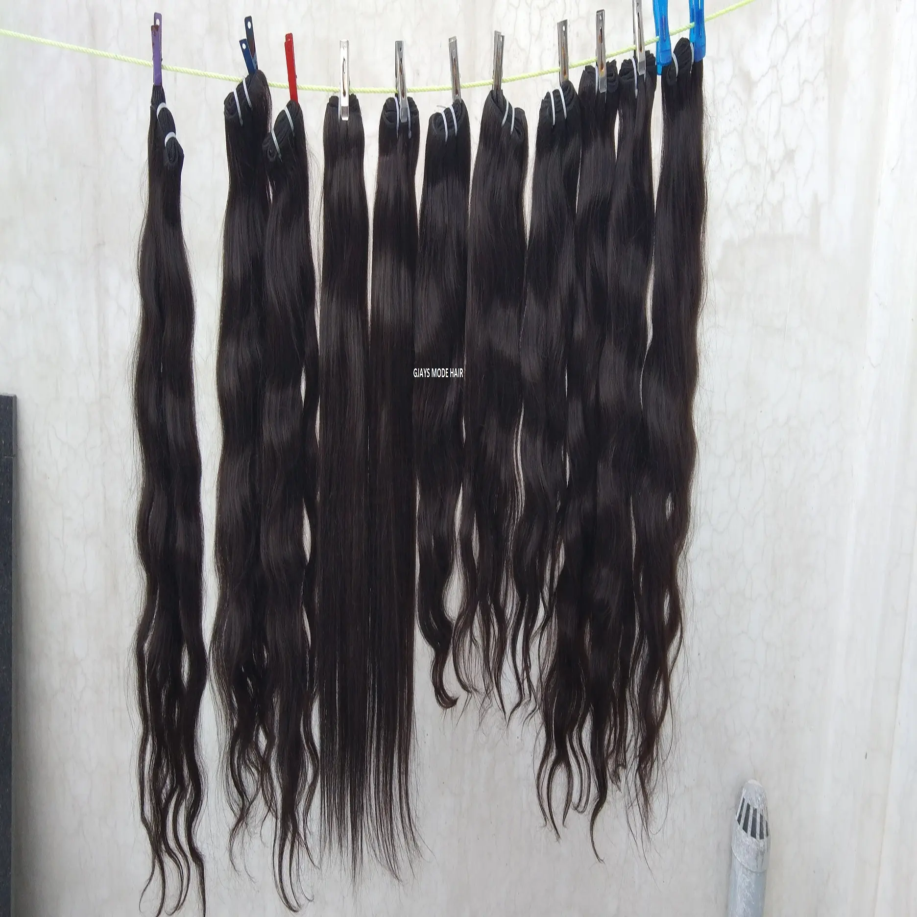 Capelli umani del tempio ondulato indiano grezzo all'ingrosso, tutte le trame naturali disponibili, onde ed estensioni seriche morbide indiane e brasiliane