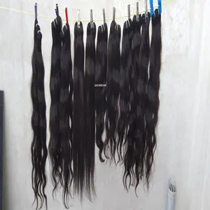 Wholesale raw indian wavy temple human hair , all natural textures available ,indian , brazilian soft silky waves and extensions