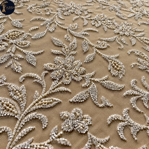 Tissu de robe perlé couleur champagne avec motifs floraux botaniques en relief |   Textile décoratif pour robes de mariée, vêtements de soirée, tenues formelles - Product Image 1