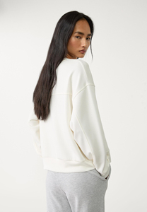 เสื้อสเวตเชิ้ตคอกลมโอเวอร์ไซส์สำหรับผู้หญิง สีพื้น แขนยาว ผ้าฝ้ายถัก ระบายอากาศได้ดี เหมาะสำหรับใส่ในฤดูใบไม้ร่วง - Product Image 3