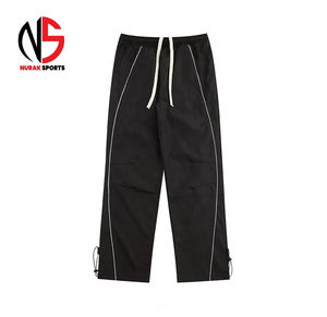 Pantalones reflectantes de nailon 2026, estilo holgado, de tela cortavientos para ropa urbana, pantalón de trabajo de seguridad, con sudadera desmontable y cortavientos ancho para mujer NURAK - Product Image 6