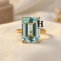 Bague solitaire en aquamarine taille émeraude en or jaune 14 carats, alternative au diamant de laboratoire pour bague en diamant de laboratoire