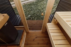 Sauna moderne <span class=keywords><strong>en</strong></span> forme de pod avec véranda intégrée, extérieur gris foncé résistant aux intempéries et chauffage au <span class=keywords><strong>bois</strong></span> pour une relaxation <span class=keywords><strong>en</strong></span> plein air toute l'année - Product Image 6