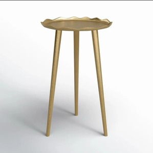 Table basse ronde moderne avec base texturée dorée et plateau noir pour le salon - Product Image 1