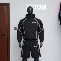 Ensemble de survêtement décontracté en polyester respirant avec logo personnalisé OEM, coupe-vent, veste à capuche et short, idéal pour l'été