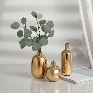 <b>Unique</b> metal flower <b>vase</b> expressing creative excellence ideal for enhancing rooms with fashionable metallic accent - Product Image 3